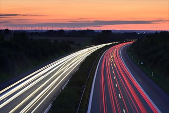 Light tracks on the A14 motorway at dusk