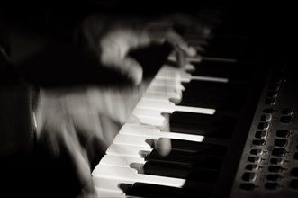 Pianist playing keyboard