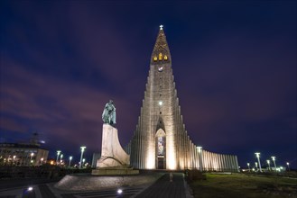 Hallgrimskirkja or church of Hallgrimur and monument to Leif Eriksson at night