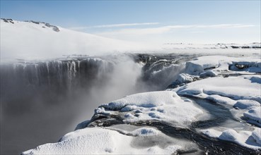 Hafragilsfoss Waterfall in winter