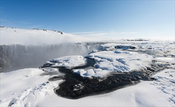 Hafragilsfoss Waterfall in winter