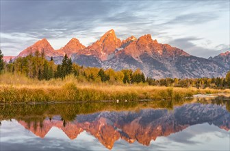 Mountains glow red at sunrise