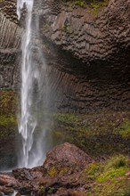 Waterfall in front of basalt rock