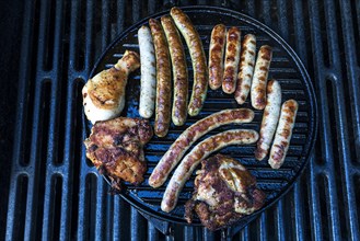 Grilled sausages and turkey meat