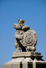 Bear figurine with armorial bearings at the gate of Castle Bernburg