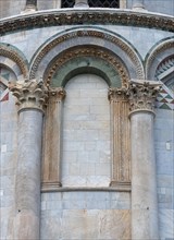 Detail of facade with round arch and columns