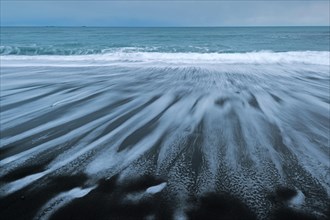 Waves on the beach of Jokulsarlon