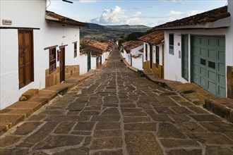 White Houses and Cobblestone Street