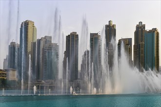 Fountains in front of skyscrapers