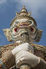 Statue of giant Yaksha demon guarding gates