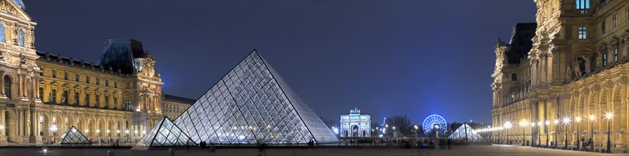 Illuminated Louvre with glass pyramid