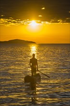 Fisherman in his canoe on Lake Malawi