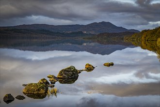 Reflection in Loch Katrine with Highlands