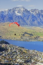 Paraglider over lake Wakatipu and Queenstown