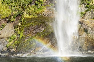 Rainbow over waterfall