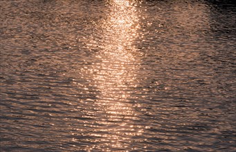 Water reflecting sunset