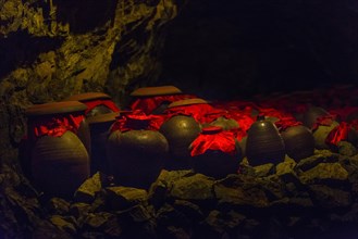 Urns in a cave at Trang An Grottoes in the Trang An Scenic Landscape Complex