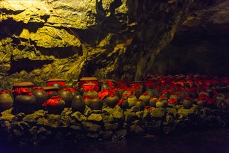 Urns in a cave at Trang An Grottoes in the Trang An Scenic Landscape Complex