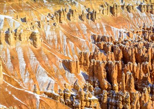 Snow-covered bizarre rocky landscape with Hoodoos in winter