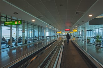 Moving walkway and smoking room at the airport