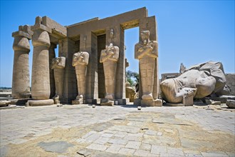 Osiris-pillars and the remains of a colossal statue of Ramses