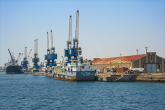 Cranes and ships in harbour