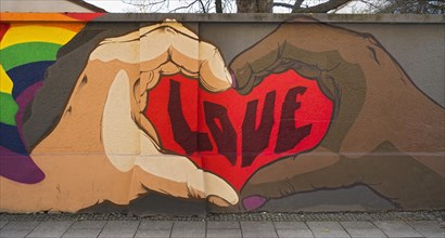 Graffiti on wall with lettering Love