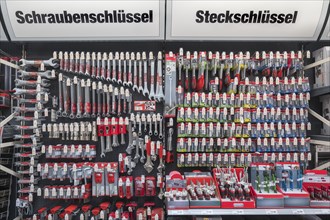 Screwdrivers and socket wrenches in hardware store