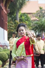 Traditional thai dancing at the Songkran Day Parade of Buddha statues