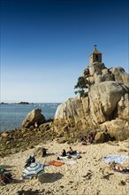 Beach and chapel on rocks, Port Blanc