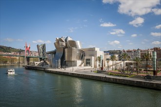 Guggenheim Museum Bilbao on the bank of the Nervion River