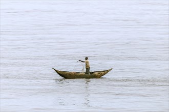 Fisherman in a pirogue