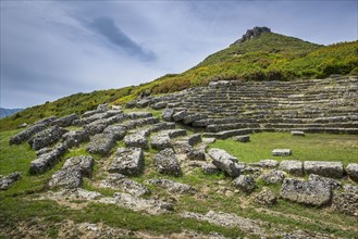 Rows of seats in the stadium of the ruined city of Amantia