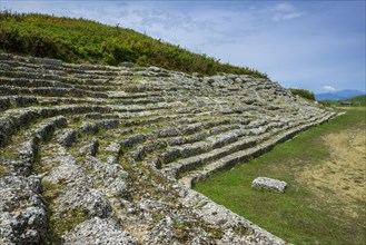 Rows of seats in the stadium of the ruined city of Amantia