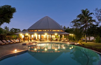 Dining room pavillion and swimming pool at Matangi Private Island Resort