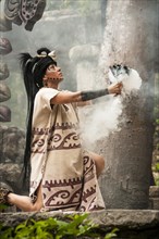 Maya woman performing in Mayan culture show Los Rostros de Ek chuah at Xcaret park
