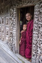 Novice and elder Monk at Shwenandaw Monastery