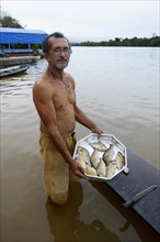 Fisherman with small catch