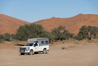 Truck on dirt road in the Namib-Naukluft National Park