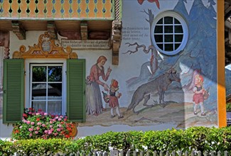 Facade of the Little Red Riding Hood House with typical Luftlmalerei