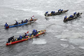 Canoe race challenge over the partly frozen Saint Lawrence River