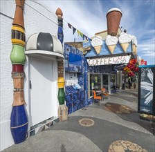 Outdoor area of the public toilet of the artist and architect Friedensreich Hundertwasser with columns and ceramic tiles