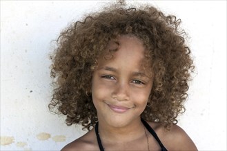 Local Cuban girl with curly hair