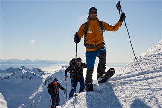 Ski mountaineers ascending to Rundfjellet