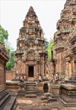 Pancharam towers with guardian figures in Banteay Srei temple