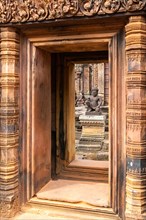 Door and guardian figure at Banteay Srei temple