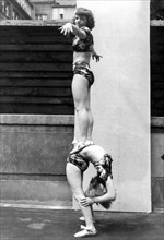 Two acrobats training