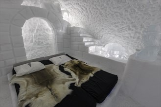 Bed with reindeer skins