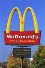 Advertising sign with logo of Mc Donald's