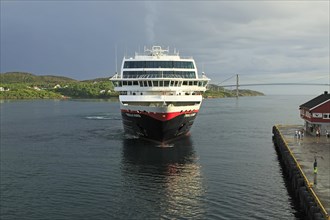Hurtigruten ship Trollfjord arriving at port of Rorvik
